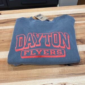 Uni. of Dayton Flyers Blue/Gray sweatshirt with Red puffy logo. Blue 84 brand